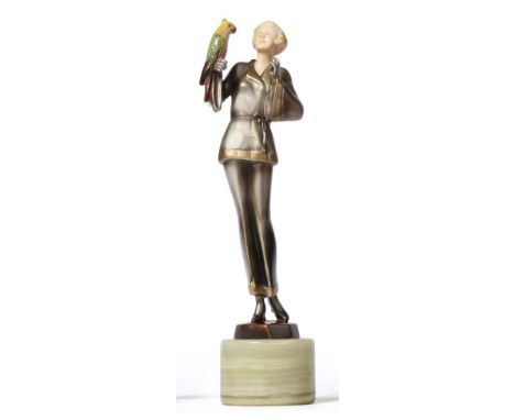 Josef Lorenzl (Austrian, 1892-1950): An Ivory and Cold-Painted Bronze Figure, circa 1925, modelled as a young woman wearing a