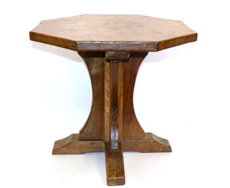 A Robert ''Mouseman'' Thompson Oak Octagonal Coffee Table, circa 1948, on a cruciform base, with carved mouse signature, 47cm