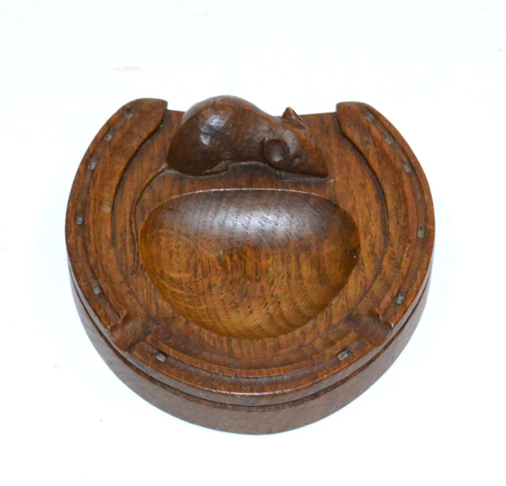 A Robert ''Mouseman'' Thompson Oak Horse Shoe Ashtray, with carved mouse signature, 12cm