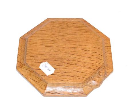 A Robert ''Mouseman'' Thompson Oak Small Chopping Board/Teapot Stand, of octagonal form, with carved mouse signature,19cm; an