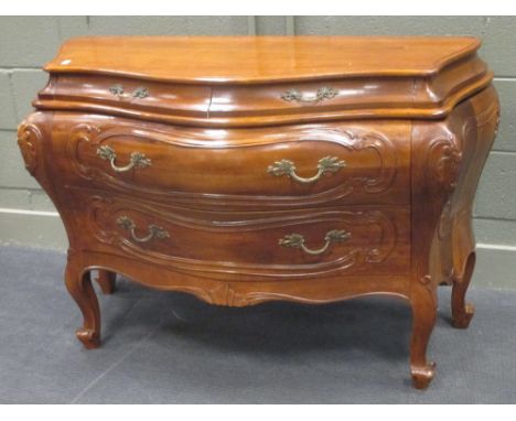 A Continental bombe commode, of serpentine outline with two short and two long drawers 84 x 115 x 53cm  
