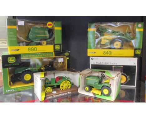 ERTL; A 990 Round Bale, boxed, A 15776 John Deere Log Skidder, boxed, A 5744 John Deere Waterloo boy, boxed, A 5591 John Deer