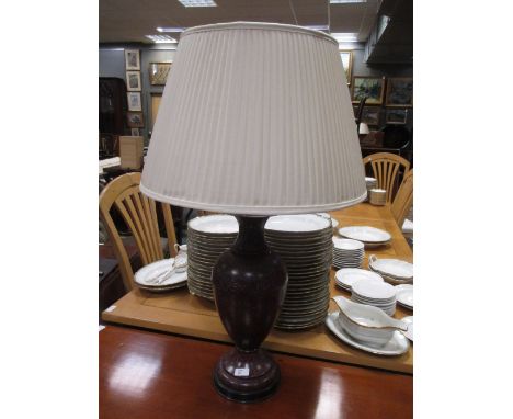 A simulated marbled tin plate vase lamp and pleated cream shade  