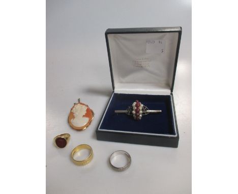 Two 18ct gold wedding rings and a cornelian set signet ring that tests for 18ct gold, 19.4g gross together with a cameo brooc