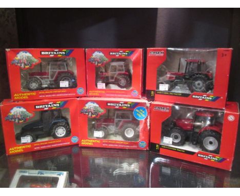 Britains; A 9501 Massey Ferguson 3680, boxed, A 42303 Case 1H 210 Puma Tractor, boxed, A 42793 Case 1H 1056 XL 2WD Tractor, b