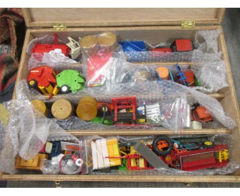 Britains; unboxed plastic and die-cast tractor and agricultural models in a scratch built wooden case (qty)  