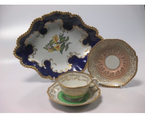 A Flight Barr &amp; Barr serving dish with a botanical painted centre, a Flight Barr &amp; Barr green and gilt cup and saucer