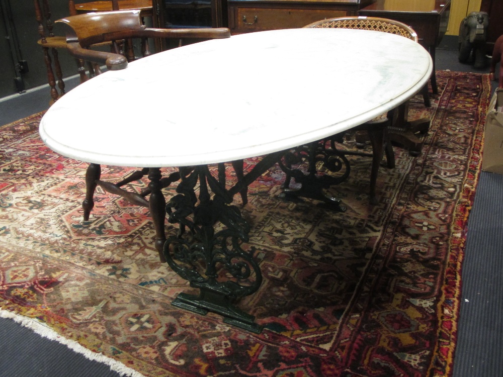 A Faux Marble Topped Garden Table On Metal Sewing Machine Base In Cheffins Fine Art