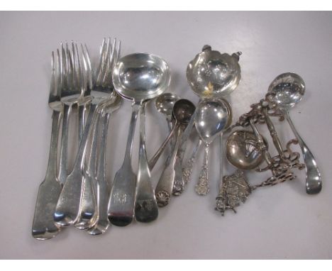 A matched set of six silver fiddle pattern table forks together with various sauce ladles, caddy spoons and small silver 26oz