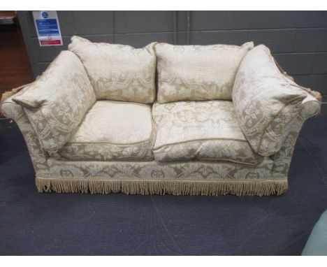 A two seater sofa in gold damask fabric with bullion fringe 200cm wide approx  