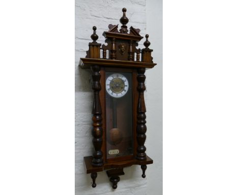 Hamburg American Clock Company - a late 19th century walnut and pine Vienna style wall clock, the white enamel chapter ring w