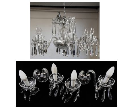 A Waterford Crystal cut clear glass chandelier, with castellated dished top, inverted stem and bowl base with six scrolling b