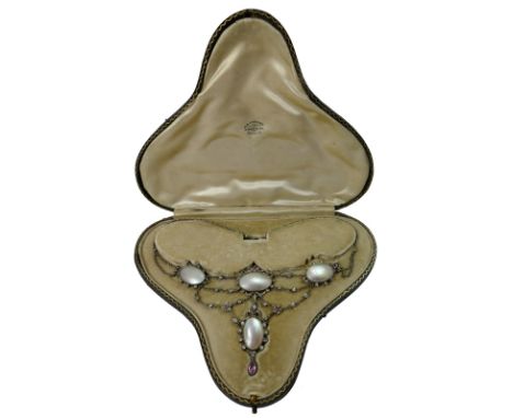 A French silver, mother of pearl and paste Belle Epoque necklace, bearing control marks, composed of three graduated panels s