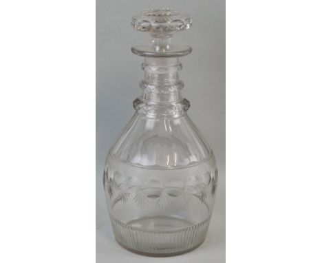 A Georgian triple ring neck decanter, of mallet shaped form with slice cut body and matching stopper, 26 cm high