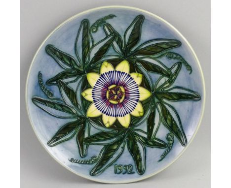 A Moorcroft limited edition 1992 Year Plate, tube lined in the Passion Flower pattern, second series first edition No., 292/5