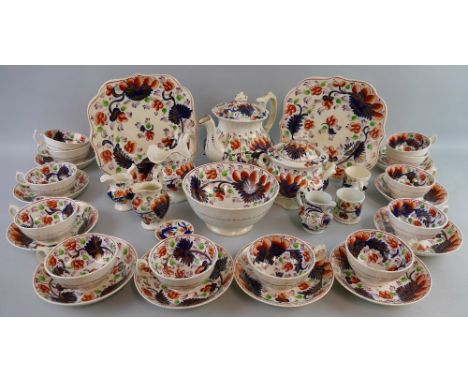 A Victorian tea set, painted in the "gawdy Welsh" style, comprising tea pot and cover, sucrier and cover, four various jugs, 