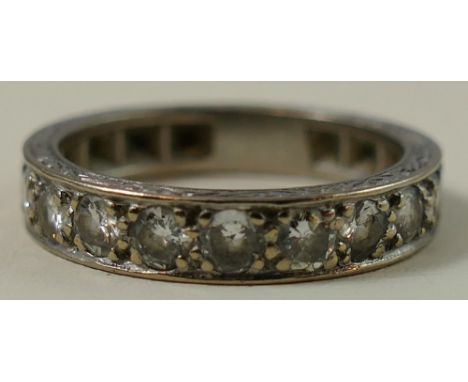 A diamond half eternity ring, channel set with ten brilliants, total weight approximately 1ct, presumed platinum, weight 5 gm