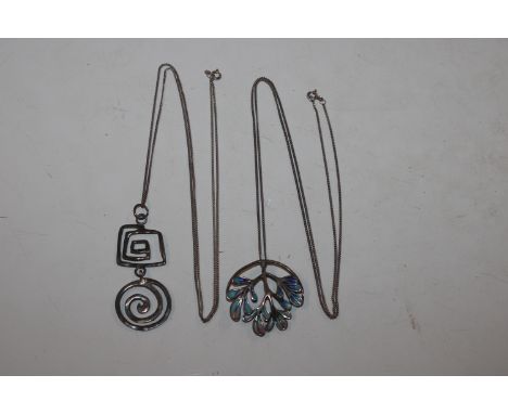 A 925 silver modernist pendant hung to a fine link chain; and a silver and enamel decorated pendant hung to fine link chain