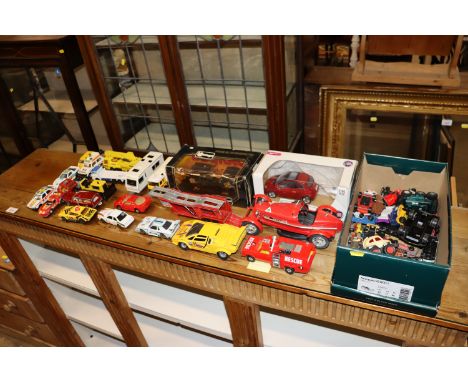 A quantity of various diecast vehicles to include Burago, matchbox, Corgi etc.