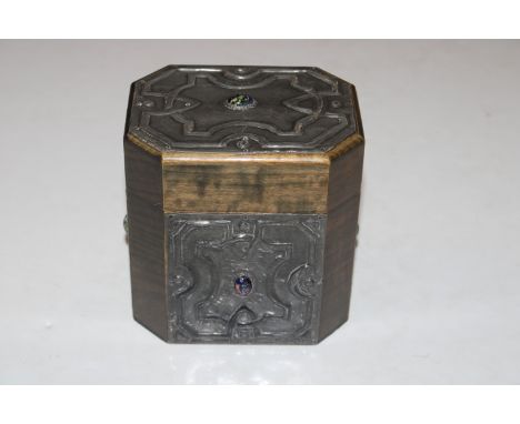 An Arts &amp; Crafts type tea caddy with stylised pewter decoration