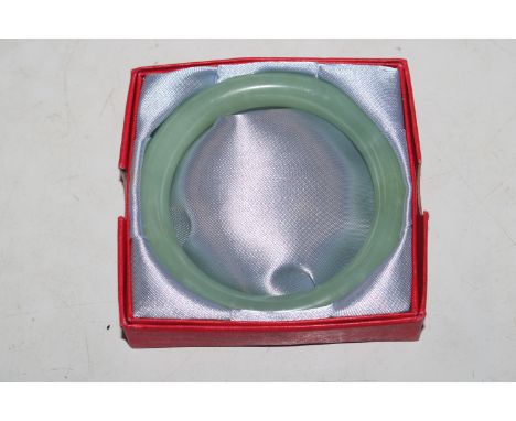 A jade coloured bangle 