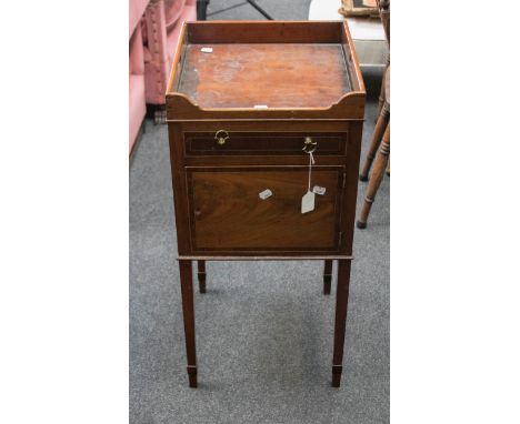 A 19th century mahogany and rosewood crossbanded tray top night commode, with single drawer over cupboard on square tapering 