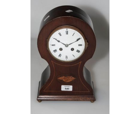 A late 19th century mahogany conch shell inlaid and strung mantel clock, the balloon case enclosing and eight-day French gong