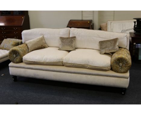 A George Smith of London bespoke two seat sofa, with ivory crushed velvet upholstery and a pair of contrasting removable bols