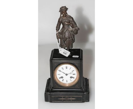 A late 19th century black slate mantel clock, the cube form case with spelter flower seller surmount enclosing a French eight