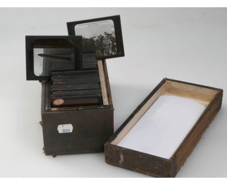 A cased collection of fifty magic lantern slides, largely of Great War French hospital views, also including some slides poss