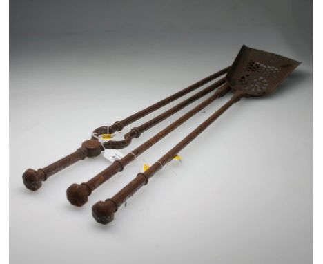 A set of three George III brushed steel fireside hearth tools, including tongs, poker and shovel