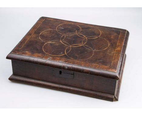 A late 17th century walnut and oystered laburnum lace box, with holly compass work to the hinged cover, 27cm  wide