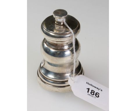 A 1930s silver dwarf peppermill, of baluster form,Sheffield 1931, by Mappin and Webb, 8cm high, 4 troy oz gross