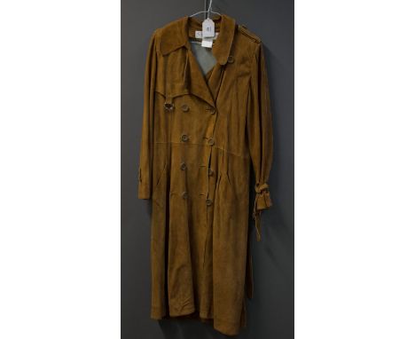 Christian Dior, a full length tan suede trench style coat, button through, with duck egg blue interior