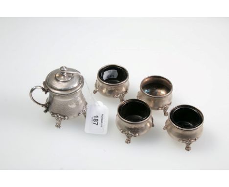 A German (800) silver five piece table cruet, comprising four engine turned salt cellars with lion's paw feet, and a matching