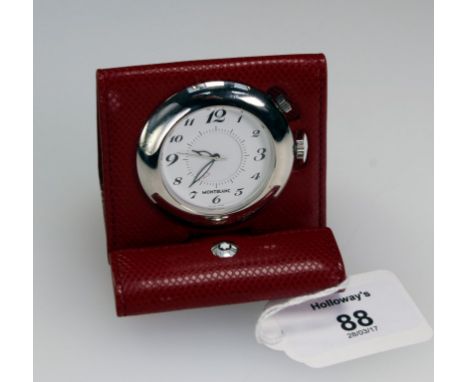 A leather cased Mont Blanc travel clock, circular with Arabic numerals and inner chapter ring with sweep seconds, reverse of 