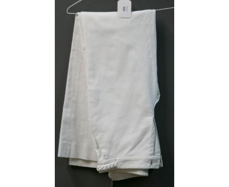 Christian Dior, a pair of cream cotton wide legged sailor-style trousers with plaited detail to the waist
