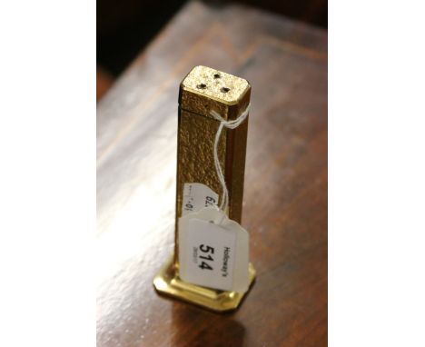 A Dunhill 'Tallboy' table cigarette lighter, with gold plated bark finish over a moulded spreading base, 11cm high