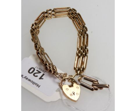 A 9ct gold and garnet gate link bracelet, with circular cut garnets to each link and padlock clasp (additional link)