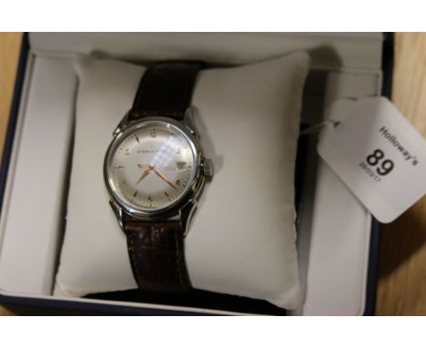A gentleman's Eterna wristwatch, circular brushed champagne dial, baton and Arabic numerals, date adjust and sweep seconds, t