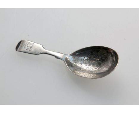 C.W., a mid 19th century silver caddy spoon, with fiddle handle, scallop and florally decorated bowl, 9.5cm, London 1853