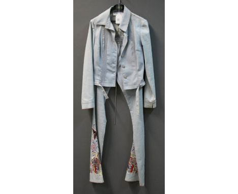 Christian Dior, a light denim spandex trouser suit, the flared trousers heavily embroidered, the jeans-style jacket with pin 