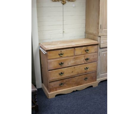 A 19th century pine chest, the rectangular top with moulded edge over two short and three graduated long drawers, with brass 