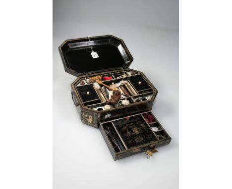 A 19th century Chinese export gilt decorated lacquer work needlework sewing box, of cushion shape, containing various associa