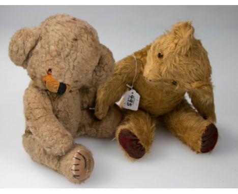 A Merrythought 'Cheeky' bear, with ear bells and growler, and an early 20th century blonde mohair bear, 42cm and 46cm