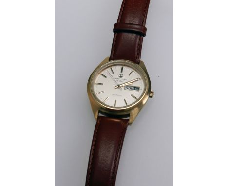 A gentleman's Favre Leuba automatic wrist watch, the brushed champagne circular dial with baton numerals and day/date adjust,