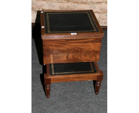 An early 19th century mahogany single step box commode, with tooled leather inset top, raised on turned supports