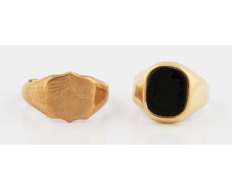 A 9ct yellow gold black hardstone intaglio ring, hallmarked Birmingham 1983, ring size N, together with a 9ct yellow gold gen