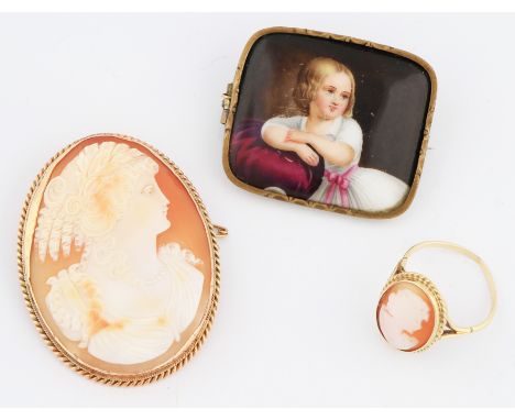 A lot to include a yellow metal framed cameo depicting a ladies portrait in profile, with rope twist border and safety chain,