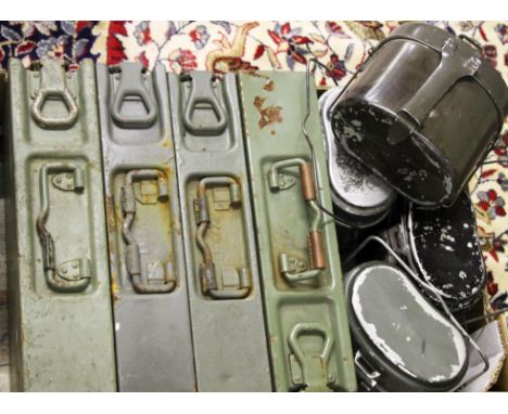 Four metal mess tins together with four army ammo cases.